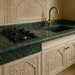 Kitchen countertops are work surfaces made from marble, granite, or quartz.